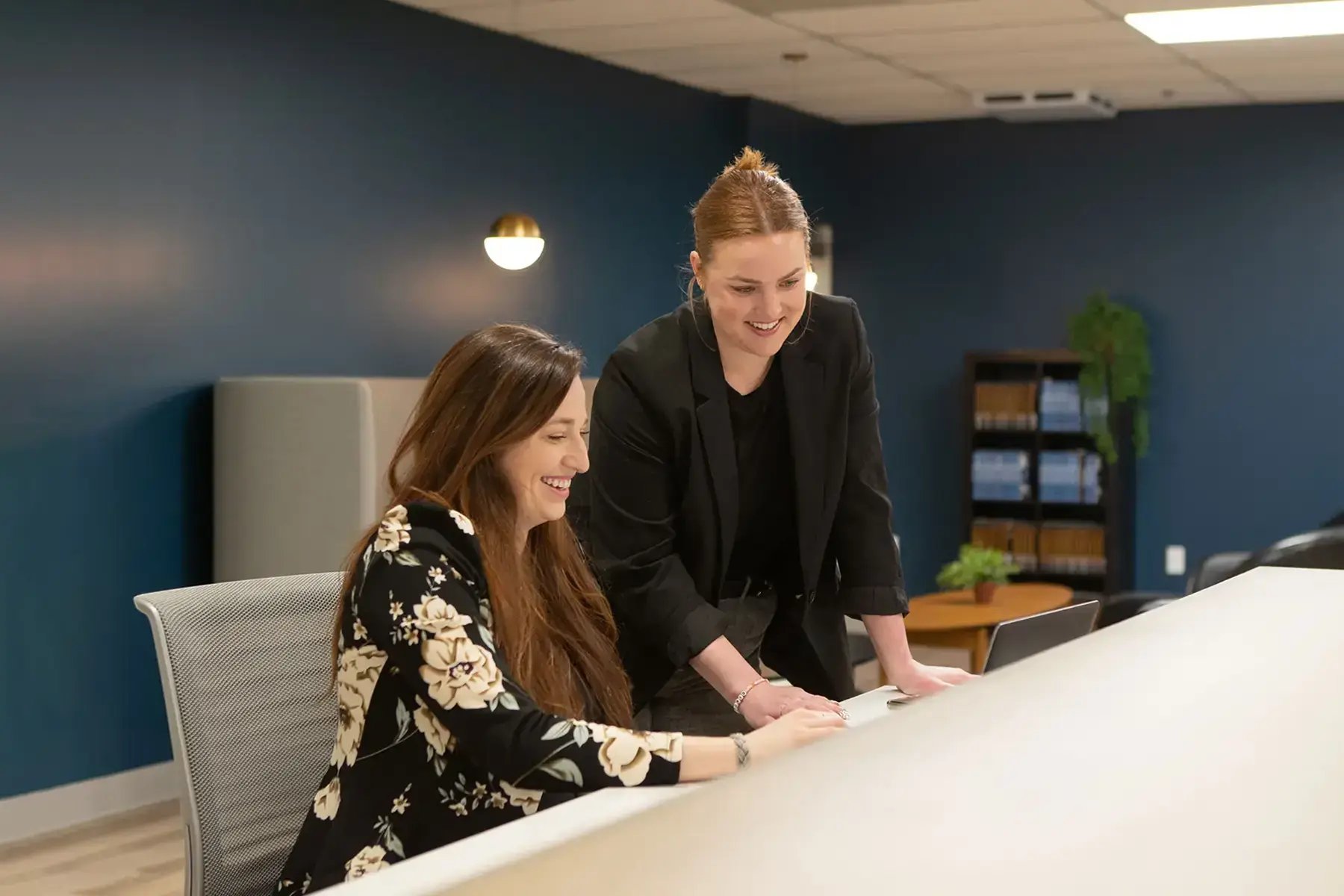 two-women-consulting-on-business-transition2